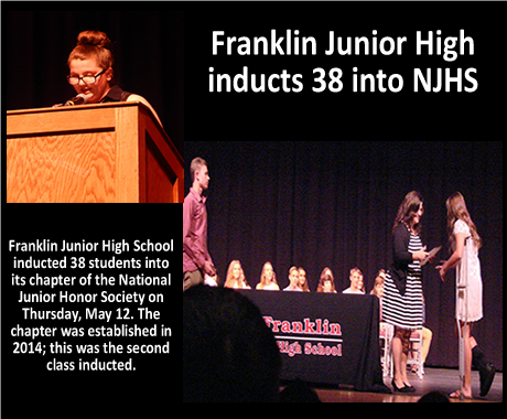 Franklin Junior High Inducts 38 into NJHS with picture of stage with people getting awards